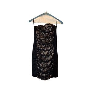Black cocktail dress with lace overlay